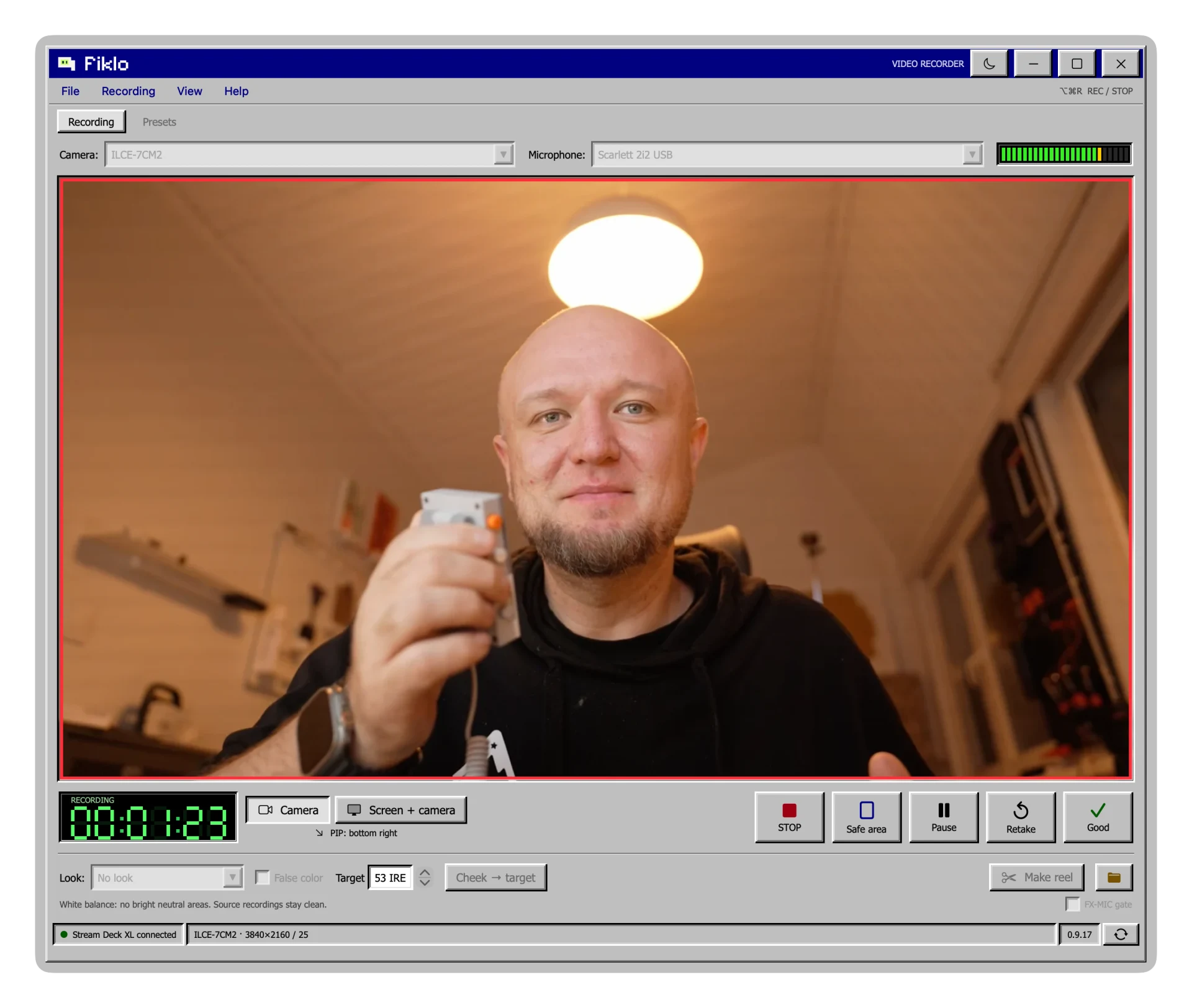 Fiklo recording window with Michał in the camera preview and the Retake and Good buttons
